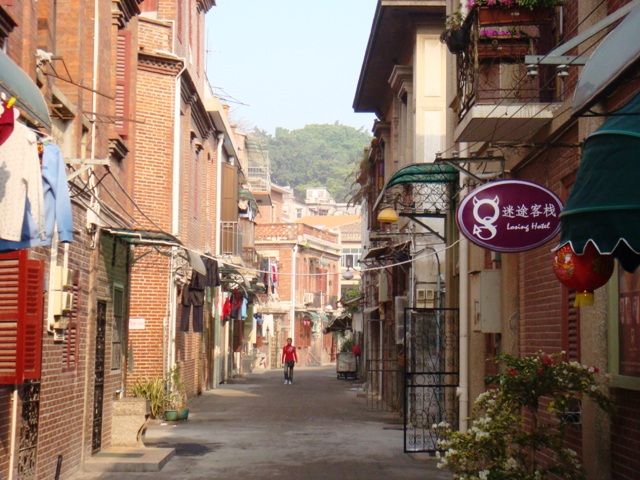 A narrow lane lined with historic brick houses on Fuzhou Street, Gulangyu